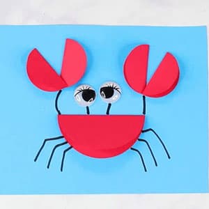 圆形手工贴画制作大螃蟹